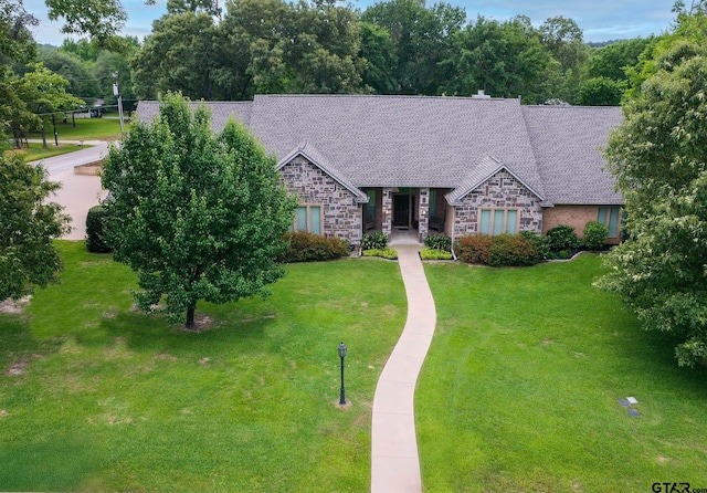 11831 Smallwood Dr, Flint, TX 75762 - view of front of property featuring stone siding and a front lawn