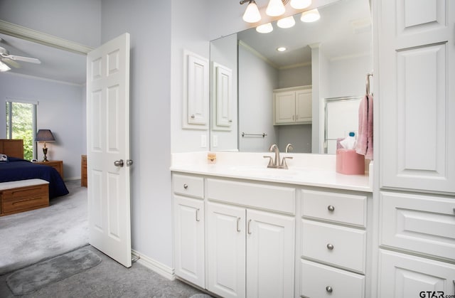 11831 Smallwood Dr, Flint, TX 75762 - ensuite bathroom with crown molding, baseboards, ceiling fan, and vanity