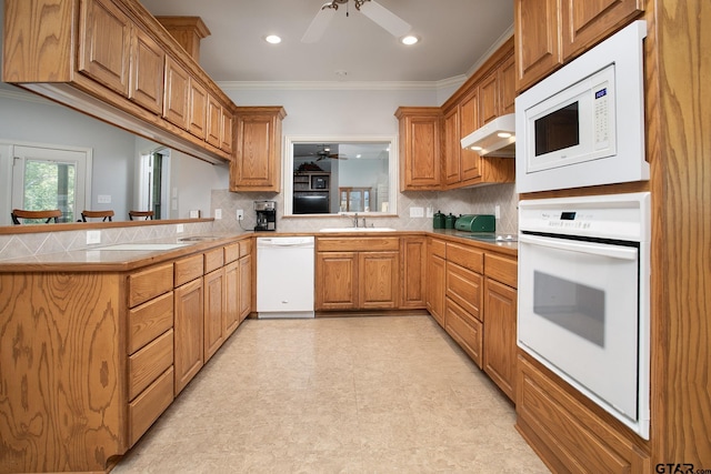 11831 Smallwood Dr, Flint, TX 75762 - kitchen featuring white appliances, ceiling fan, a sink, crown molding, and tasteful backsplash