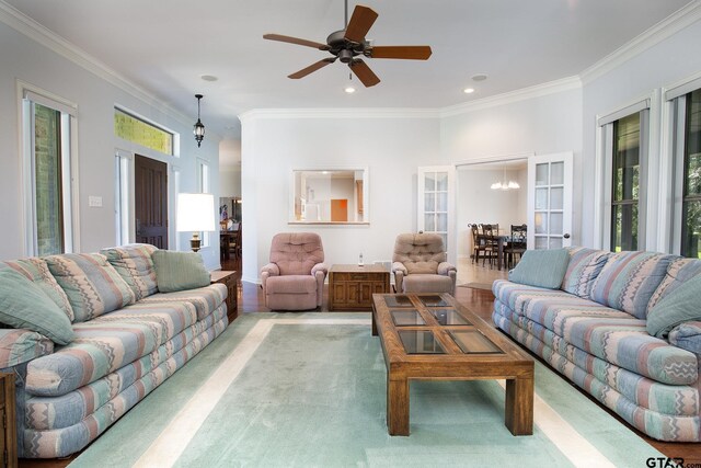 11831 Smallwood Dr, Flint, TX 75762 - living room featuring crown molding, ceiling fan, a chandelier, and recessed lighting
