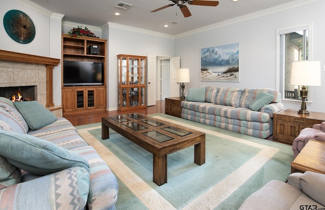 11831 Smallwood Dr, Flint, TX 75762 - living room featuring ceiling fan, ornamental molding, recessed lighting, and a fireplace