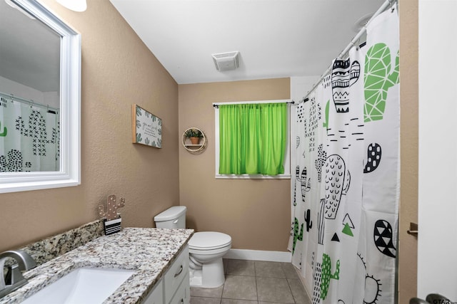 bathroom featuring tile patterned flooring, vanity, toilet, and a shower with shower curtain