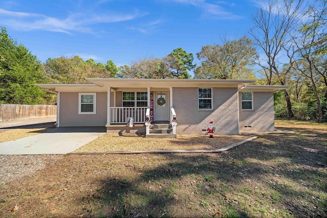 ranch-style home with covered porch