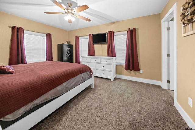 bedroom featuring ceiling fan and light colored carpet