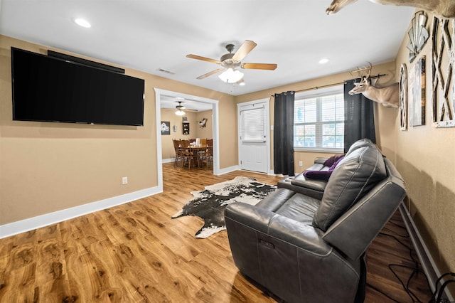 living room with light hardwood / wood-style floors