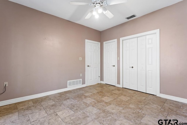 unfurnished bedroom with ceiling fan