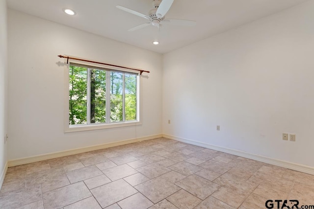 unfurnished room with ceiling fan