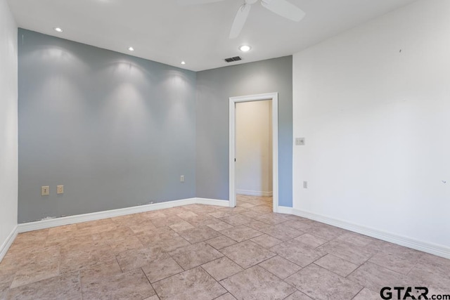 empty room featuring ceiling fan