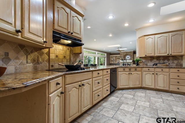 kitchen featuring light brown cabinets, backsplash, a skylight, and ceiling fan