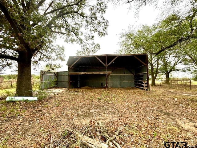 exterior space featuring an outdoor structure