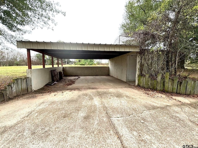 view of car parking with a carport