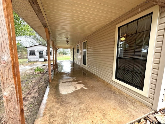 view of patio / terrace featuring a carport