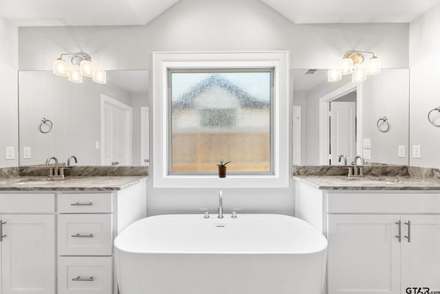 10071 Dayspring, Flint, TX 75762 - full bathroom with a freestanding tub and two vanities