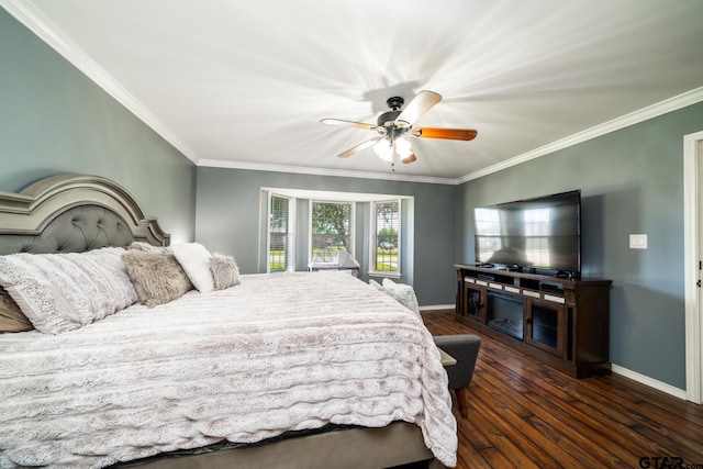 bedroom featuring ceiling fan, crown molding, and dark hardwood / wood-style flooring