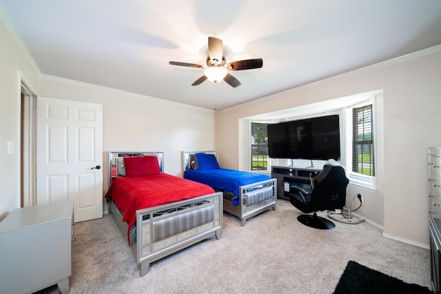 bedroom featuring ceiling fan, light carpet, and ornamental molding