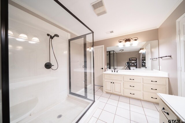 bathroom with a shower with shower door, vanity, tile patterned floors, and crown molding