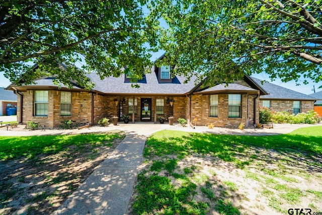 view of front of home with a front lawn