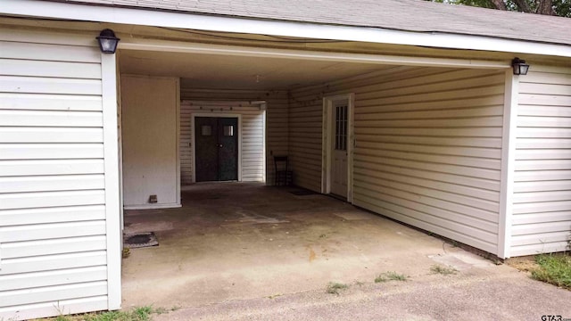 property entrance featuring a patio