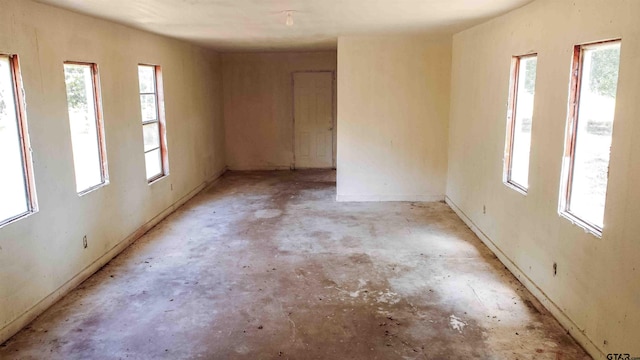 spare room featuring plenty of natural light