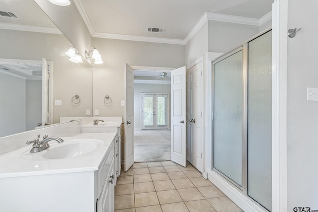 full bathroom featuring visible vents, a sink, and ornamental molding