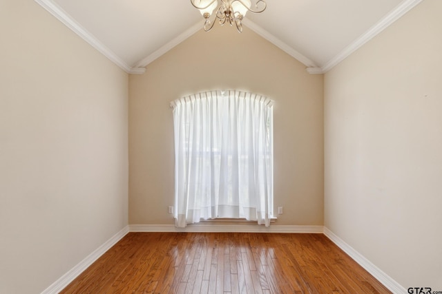 unfurnished room featuring crown molding, a notable chandelier, baseboards, and light wood-type flooring