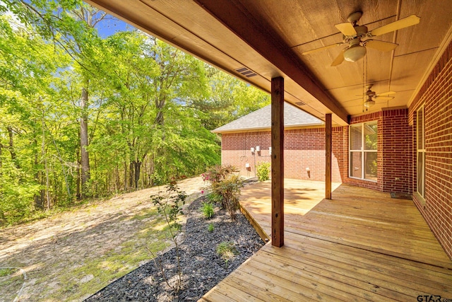 wooden deck with ceiling fan