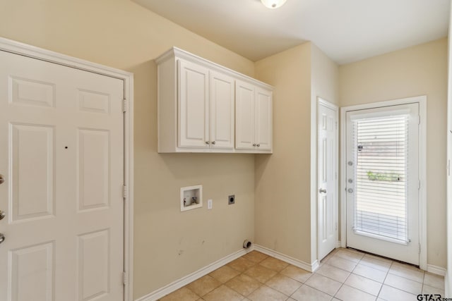 laundry area with hookup for an electric dryer, baseboards, light tile patterned floors, washer hookup, and cabinet space