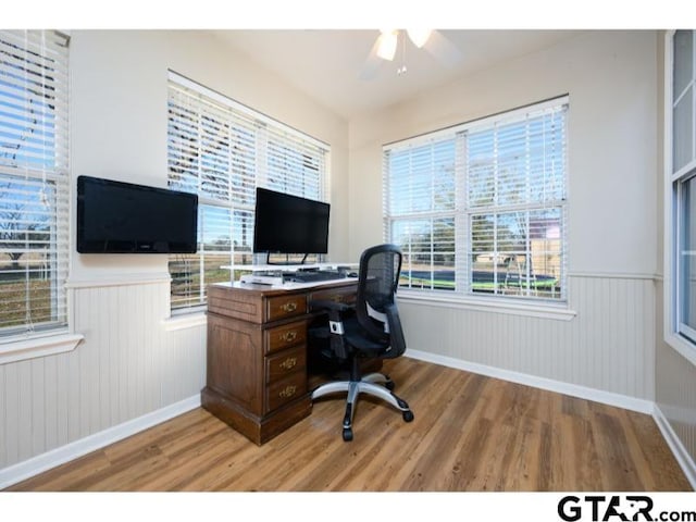 office space with ceiling fan and hardwood / wood-style floors