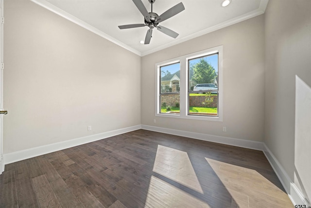 unfurnished room with crown molding, ceiling fan, and dark wood-type flooring