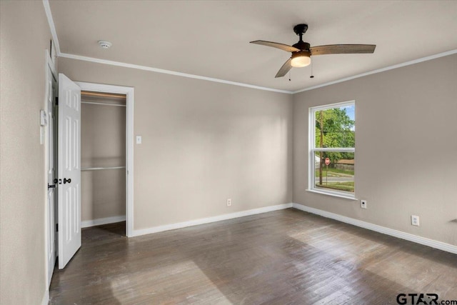 1330 Graham Dr, Tyler, TX 75701 - empty room with baseboards, crown molding, ceiling fan, and wood finished floors