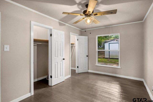 1330 Graham Dr, Tyler, TX 75701 - unfurnished bedroom featuring ceiling fan, ornamental molding, baseboards, and wood finished floors