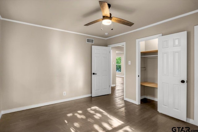 1330 Graham Dr, Tyler, TX 75701 - unfurnished bedroom featuring crown molding, visible vents, baseboards, dark wood-type flooring, and ceiling fan