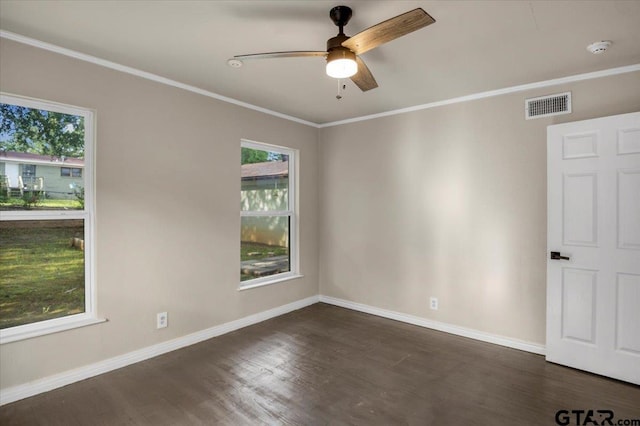 1330 Graham Dr, Tyler, TX 75701 - unfurnished room with wood finished floors, visible vents, baseboards, ceiling fan, and ornamental molding