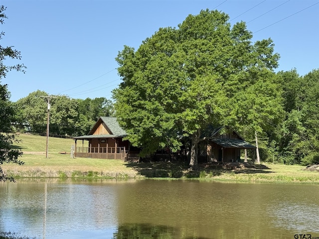 1801 Robbins Rd, Athens, TX 75751 - living area featuring wood ceiling, plenty of natural light, visible vents, and a chandelier