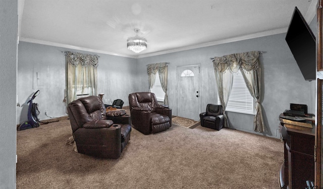 living room with ornamental molding, carpet floors, and a chandelier