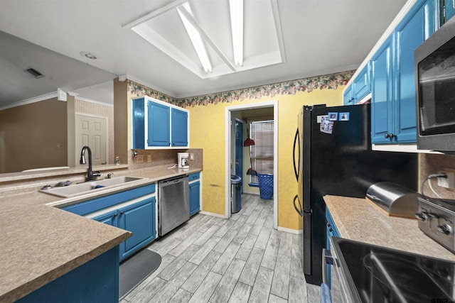 kitchen with light hardwood / wood-style floors, sink, blue cabinetry, crown molding, and appliances with stainless steel finishes