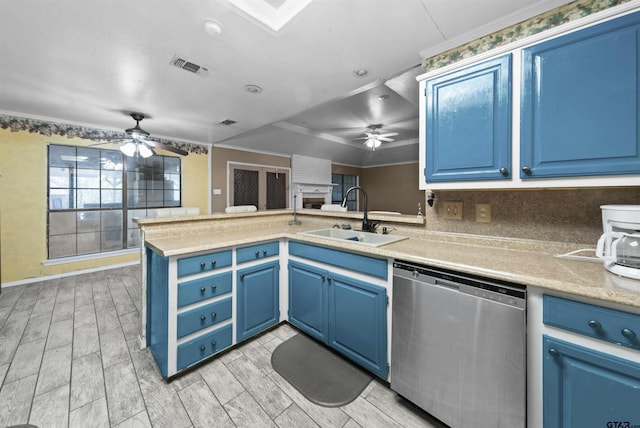 kitchen with sink, kitchen peninsula, crown molding, blue cabinets, and dishwasher