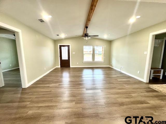 641 N Weldon St, Frankston, TX 75763 - entryway featuring wood finished floors, ceiling fan, and baseboards