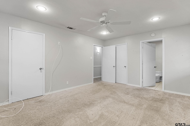 3200 Decharles St, Tyler, TX 75701 - unfurnished bedroom with carpet, connected bathroom, baseboards, recessed lighting, and a ceiling fan