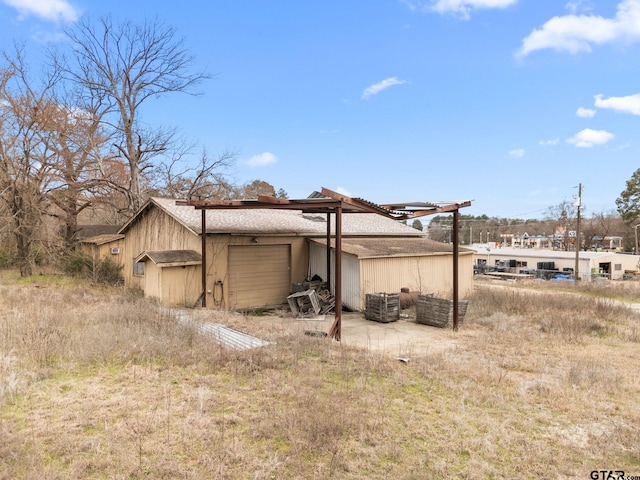 view of outdoor structure with central AC unit