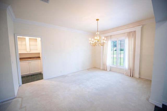 carpeted empty room featuring a notable chandelier and ornamental molding