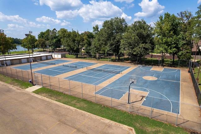 view of sport court featuring tennis court