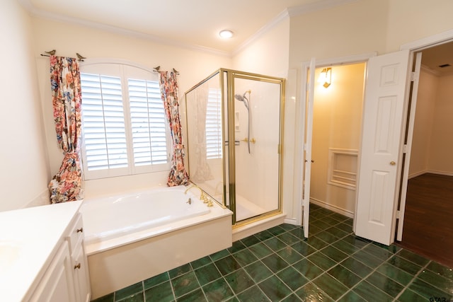 bathroom with vanity, tile patterned floors, crown molding, and independent shower and bath