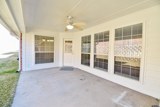 view of patio with ceiling fan