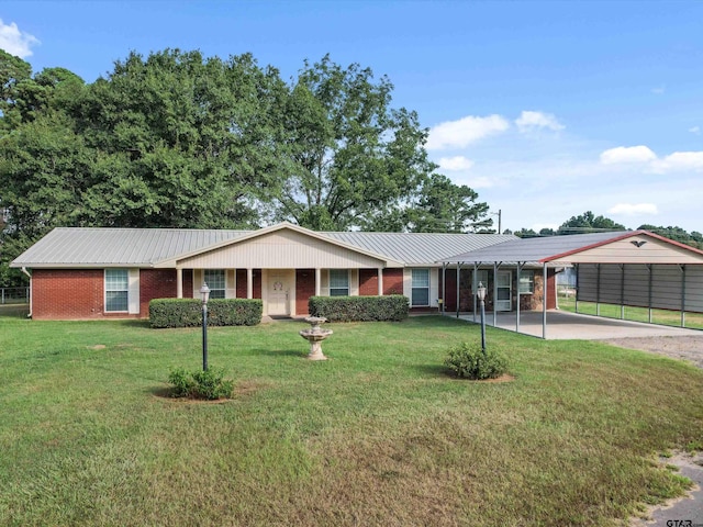 ranch-style house with a carport and a front lawn