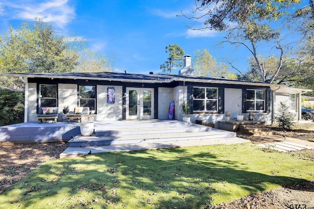 view of front of house with french doors