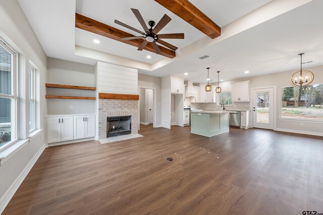 interior space with dark wood-type flooring and a wealth of natural light