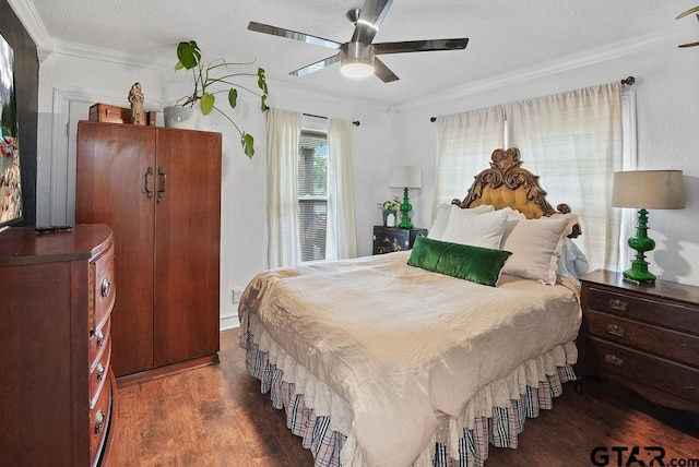 818 Rusk St, Tyler, TX 75701 - bedroom featuring wood finished floors, ornamental molding, and ceiling fan