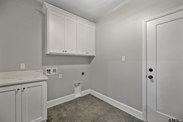 laundry area with baseboards, hookup for a washing machine, cabinet space, and electric dryer hookup