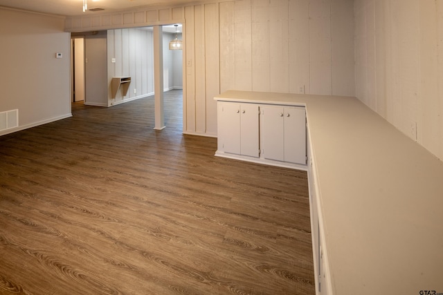 empty room with hardwood / wood-style flooring